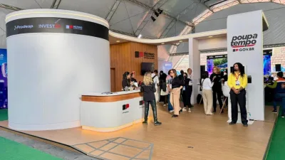 Totem de autoatendimento do Poupatempo em exposição no evento de inovação em São Paulo.